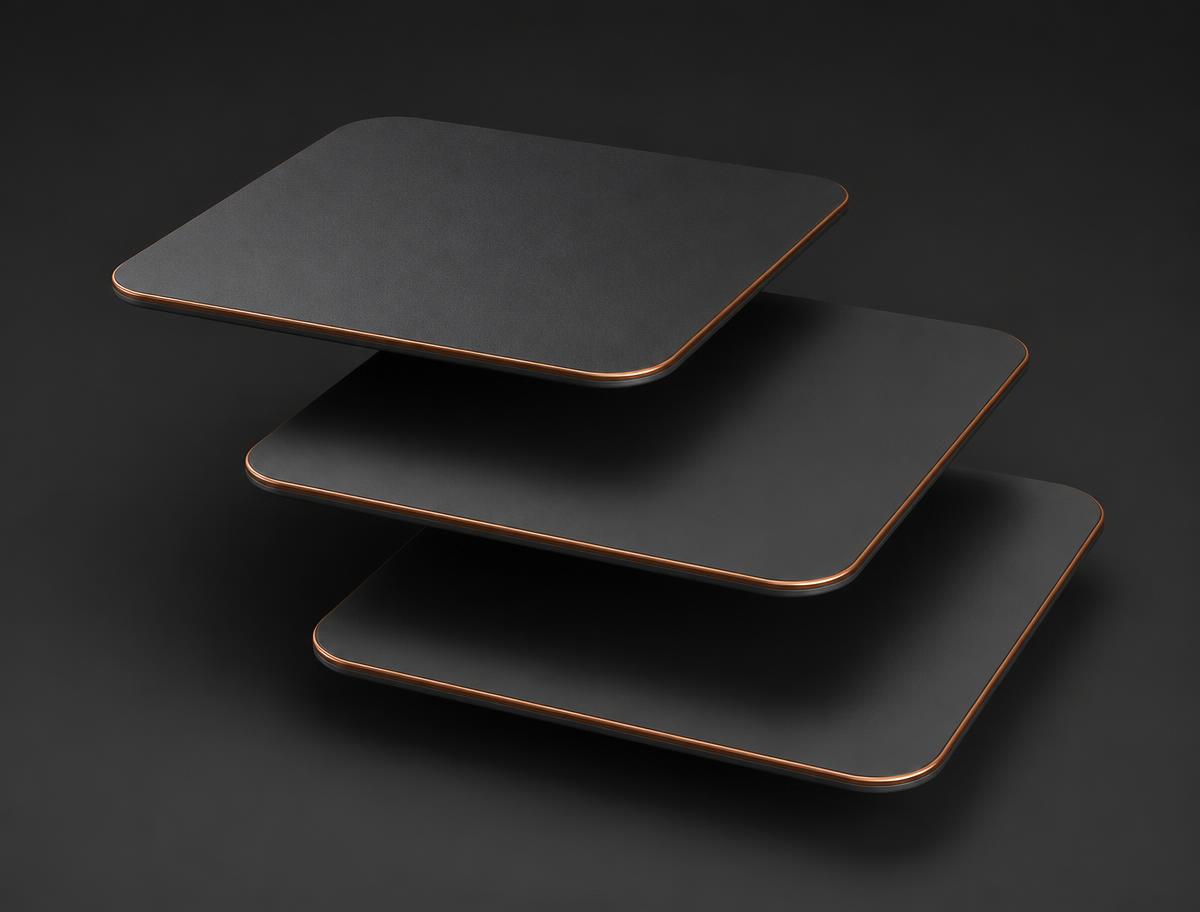 Three layered charcoal panels with copper edges, representing build, grow and automate